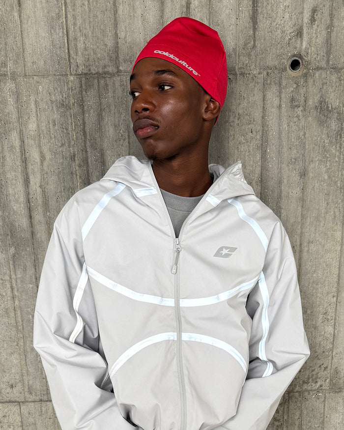 FLASH BEANIE RED - red beanie, on model close-up - Cold Culture