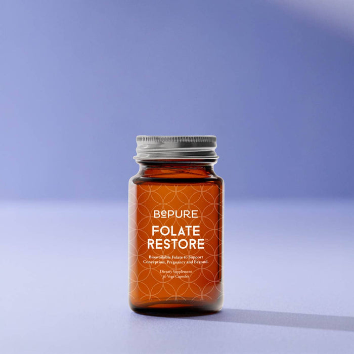 Bottle of BePure Folate Restore on a gradient blue background.