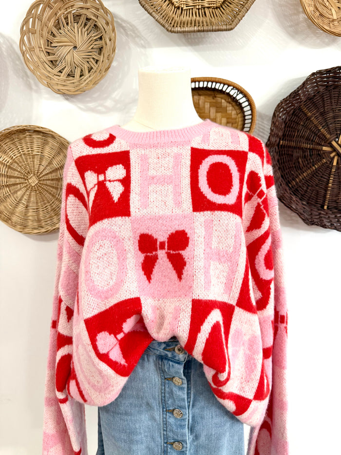 The “Ho Ho Ho” & Bow Sweater in Pink & Red