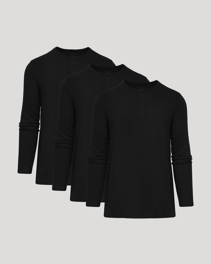 Three black waffle knit long sleeve Henley shirts displayed together, showcasing the Black Waffle Long Sleeve Henley 3-Pack, a men's basics essential.