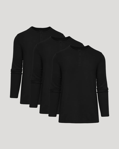 Three black waffle knit long sleeve Henley shirts displayed together, showcasing the Black Waffle Long Sleeve Henley 3-Pack, a men's basics essential.