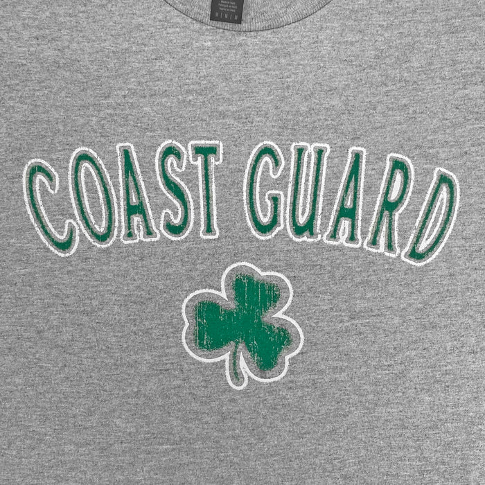 Gray t-shirt with 'COAST GUARD' text and shamrock design on a plain background