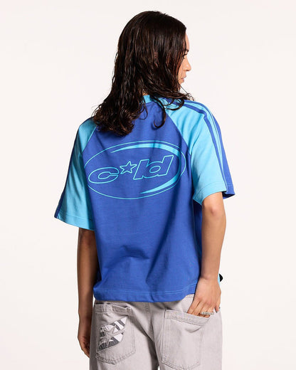 COMBO TEE BLUE - two-tone blue raglan tee, back view on female model - Cold Culture #woman
