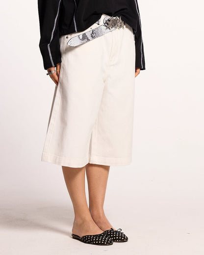 COWBOY SHORTS WHITE - white denim shorts, front view on female model - Cold Culture #woman