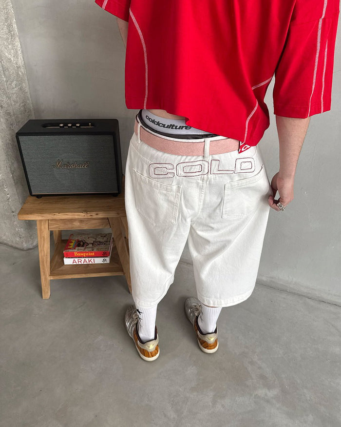 COWBOY SHORTS WHITE - white denim shorts, back view on male model - Cold Culture