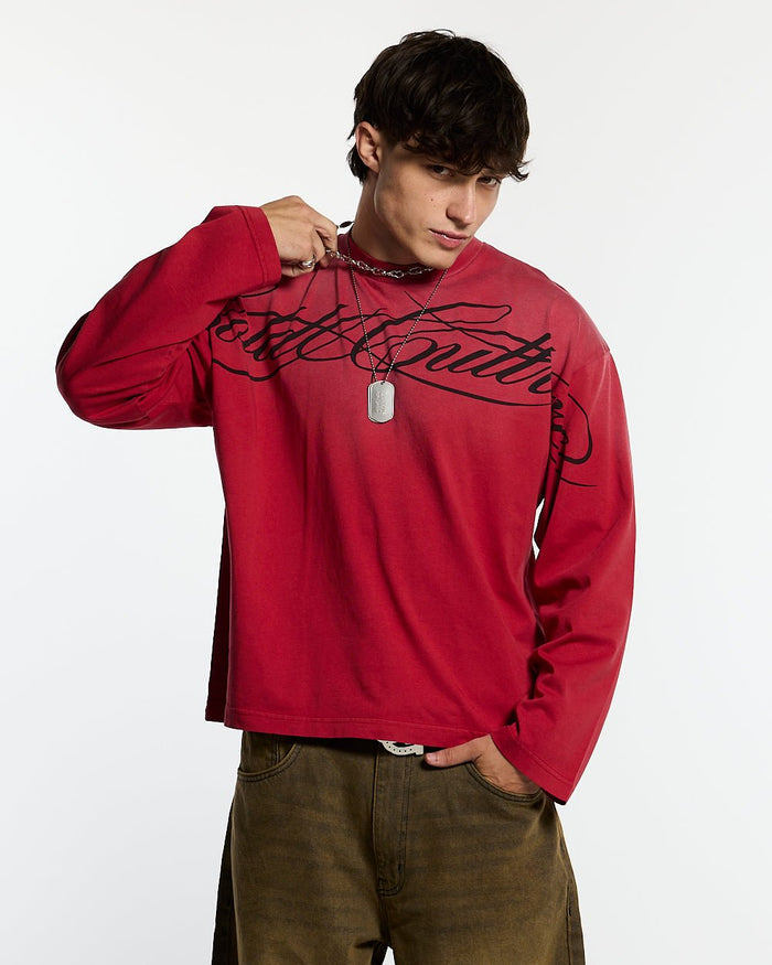 CROSSED SCRIPT LONGSLEEVE RED - washed red script print longsleeve tee, front view on male model - Cold Culture #man