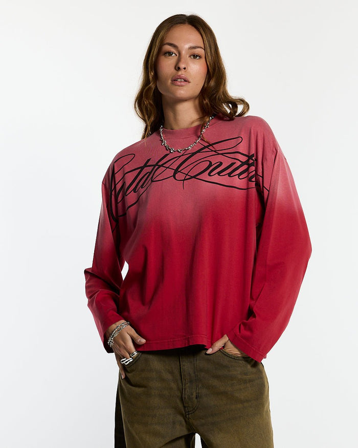 CROSSED SCRIPT LONGSLEEVE RED - washed red script print longsleeve tee, front view on female model - Cold Culture #woman