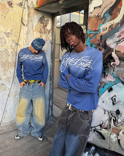 CROSSED SCRIPT LONGSLEEVE VIBRANT BLUE - washed blue script print longsleeve tee, street style shot - Cold Culture