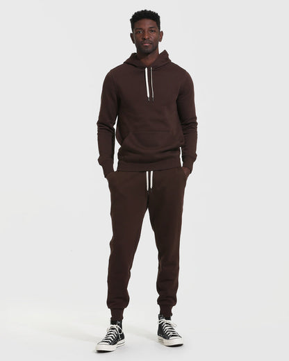 Man wearing Dark Oak Fleece French Terry Pullover Hoodie with joggers.