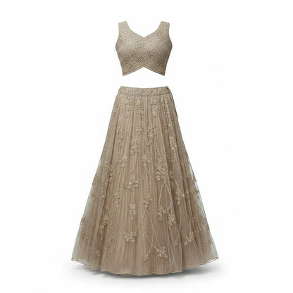 Kurti Connection USA champagne embellished sleeveless crop top and floor-length skirt set with floral embroidery