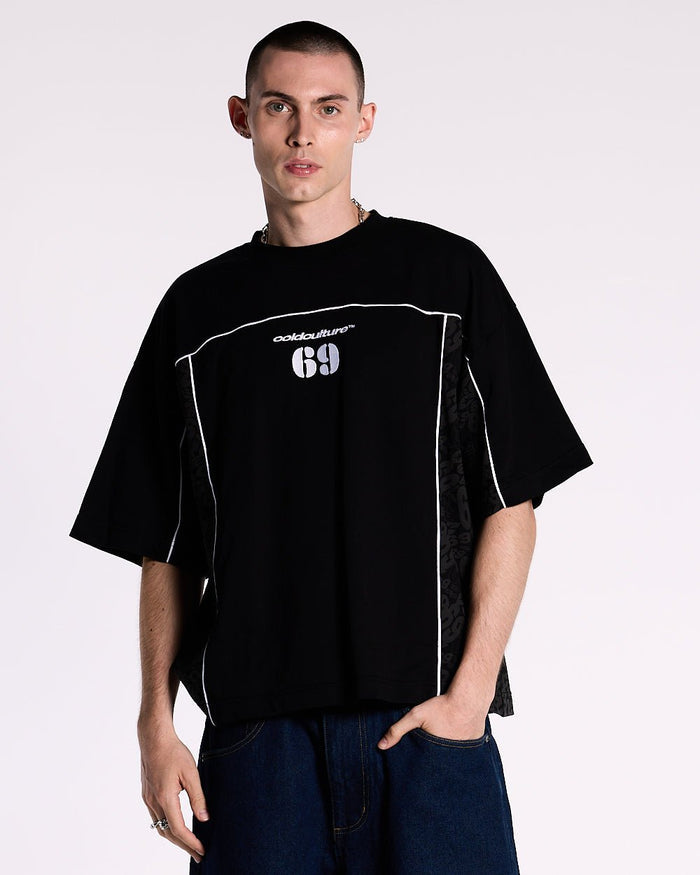 GAME PLAYER TEE BLACK - black jersey style tee, front view on male model - Cold Culture #man