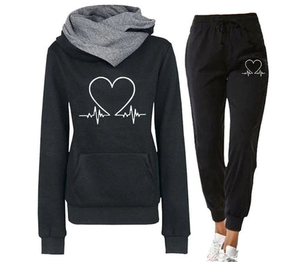 women's love heart printed sports suit flat lay arrangement of all five colorways black green blue gray khaki for easy color selection