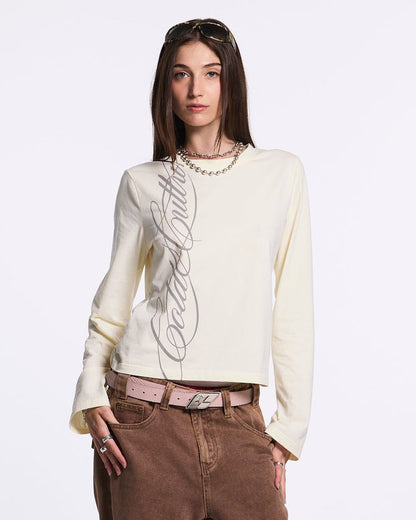 SCRIPT LONGSLEEVE TEE WHITE - white script print longsleeve tee, front view on female model - Cold Culture #woman
