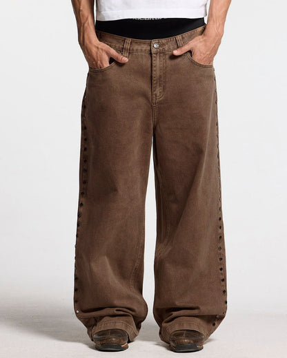 STUDS PANTS BROWN DENIM - brown studded denim pants, front view on male model - Cold Culture #man