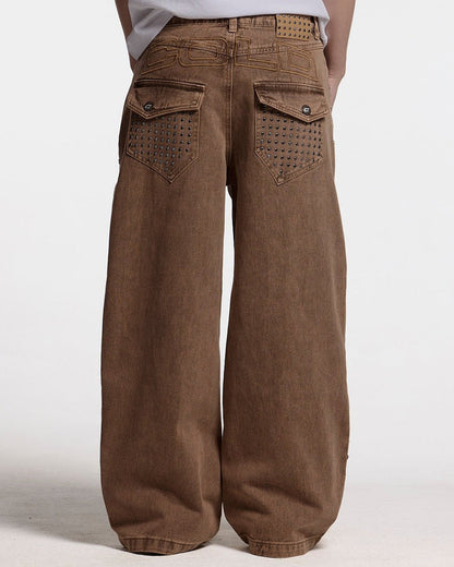 STUDS PANTS BROWN DENIM - brown studded denim pants, back view on female model - Cold Culture #woman