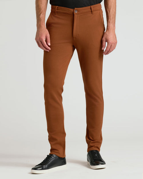 Suede Brown Slim Comfort Knit Chino Pant with black sneakers.