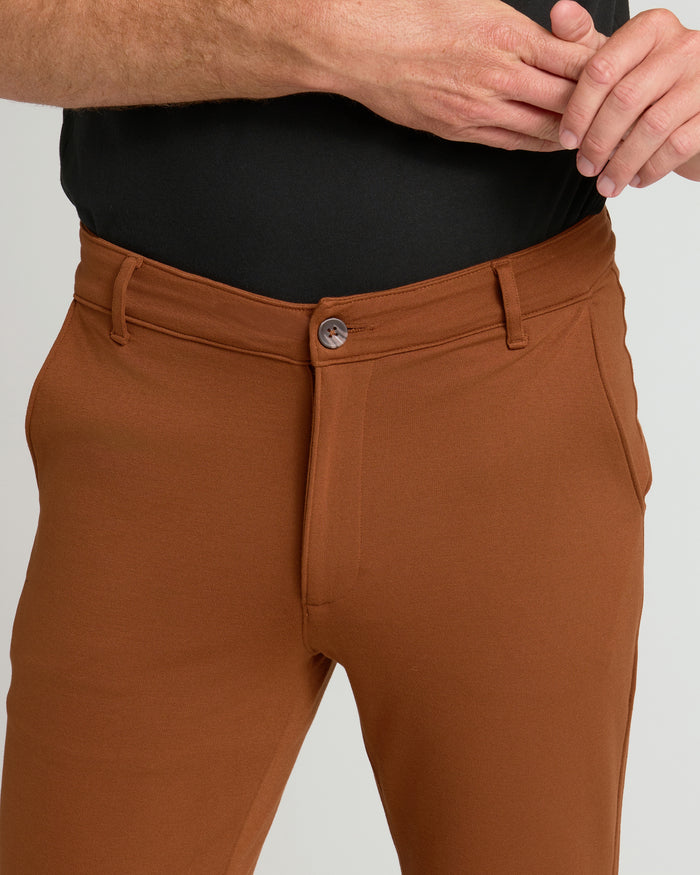 Suede Brown Slim Comfort Knit Chino Pant worn with black top.