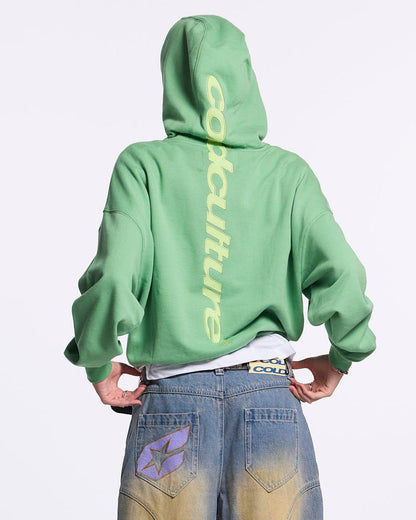 VERTICAL HOODIE GREEN - green vertical logo hoodie, back view on female model - Cold Culture #woman