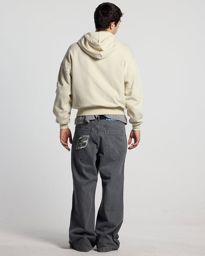 WALKER ZIP HOODIE LIGHT GREY - cream zip-up hoodie with patches, back view on male model - Cold Culture #man