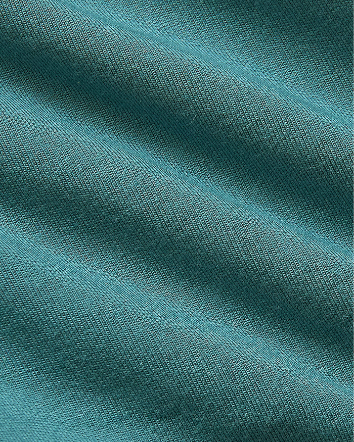 Womens Stormcloud Slouch Pullover Crew, teal-green knit fabric, close-up stitch.