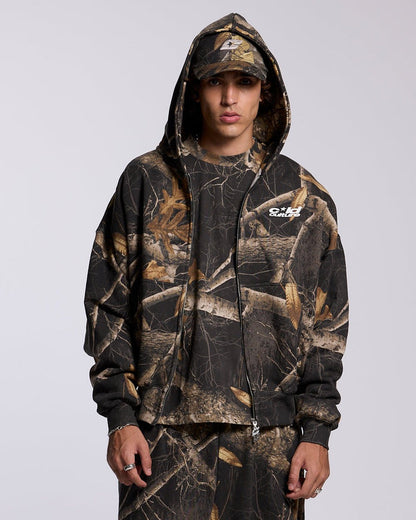 ZIP HOODIE REALTREE BLACK - black camo zip-up hoodie, front view on male model - Cold Culture #man
